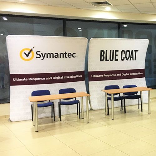 Vertical curve fabric display stand 